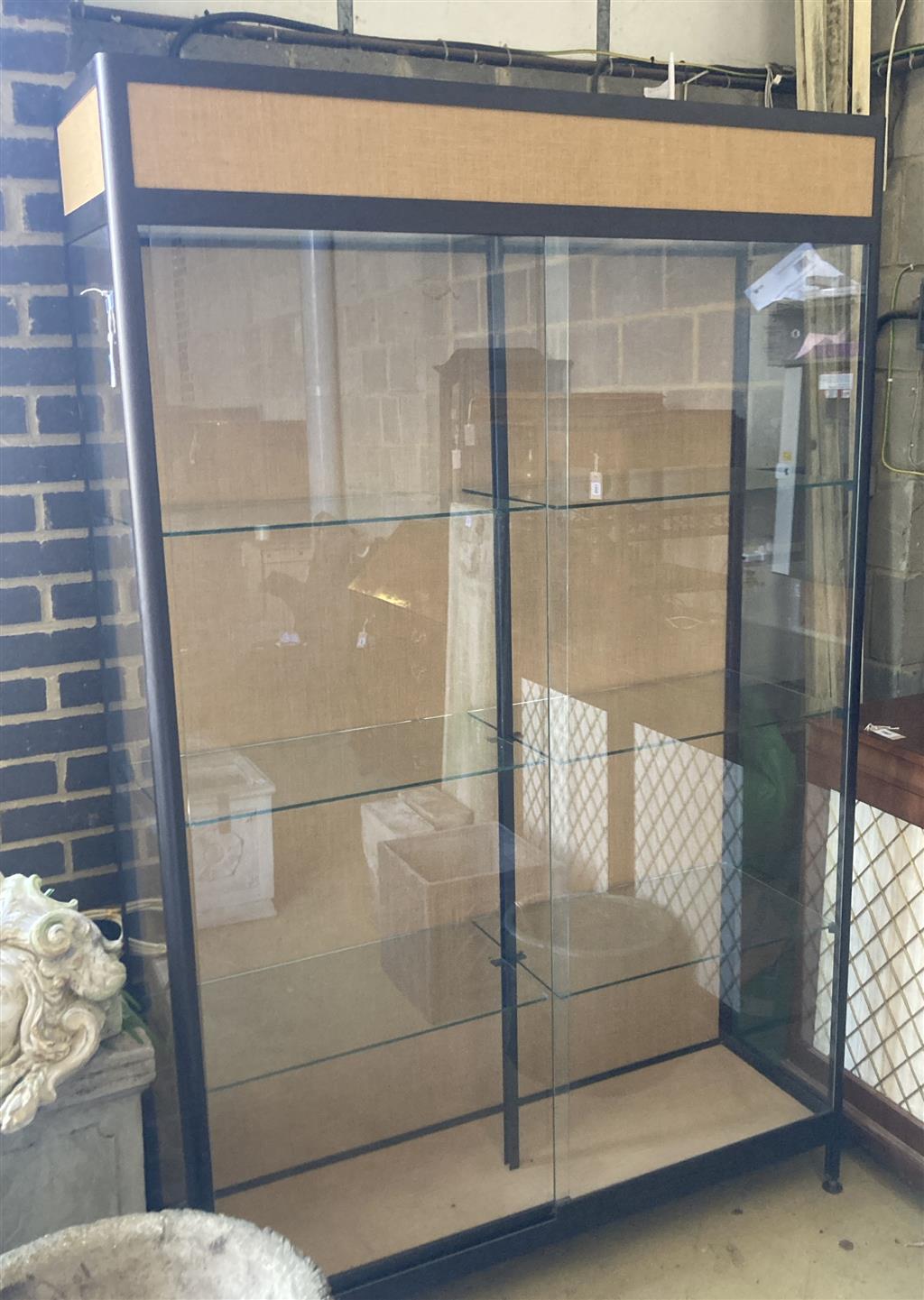 A shop display cabinet, width 128cm, depth 39cm, height 203cm